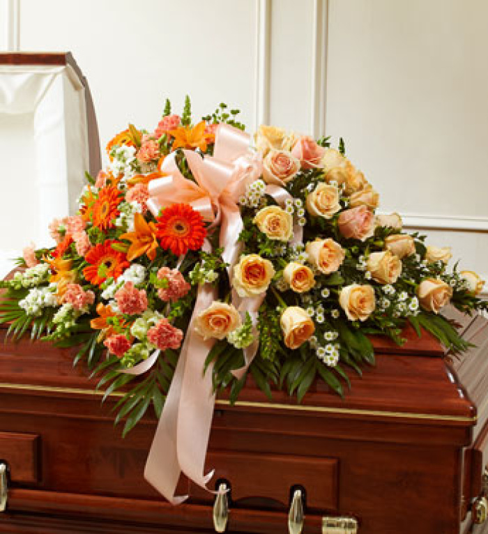 Peach, Orange, and White Casket Spray